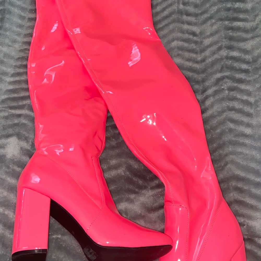 Hot pink thigh high boots